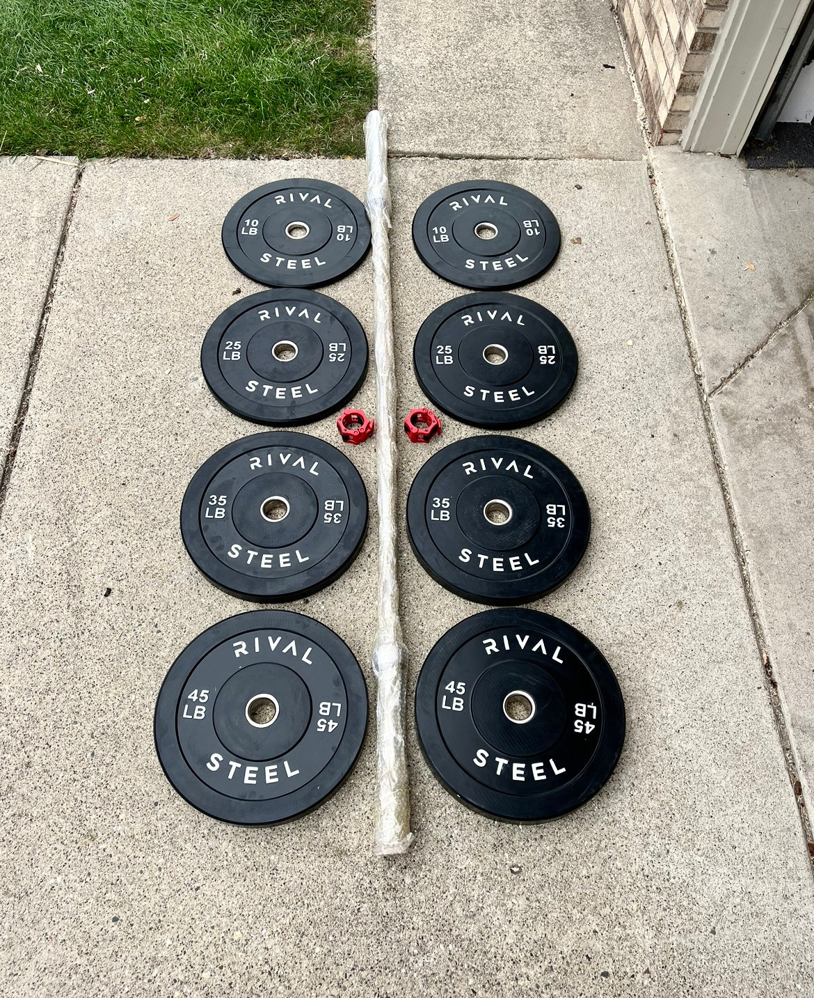 RIVAL STEEL 230lb Blackout Bumper Plate Weight Set