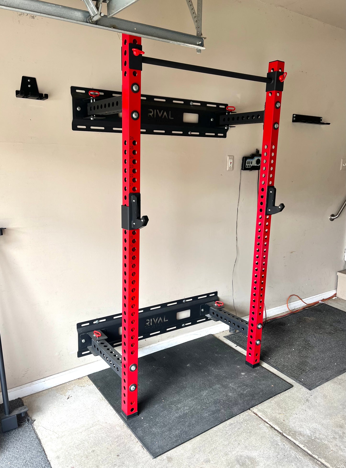 RIVAL STEEL Foldable Wall-Mounted Squat Rack